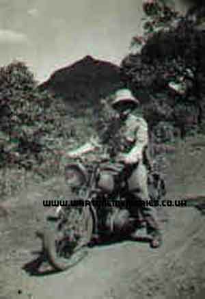 My grandfather on his motorbike in Poona